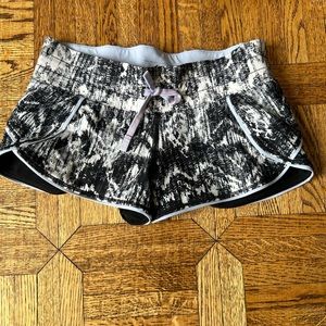 Ivivva black white and purple reversible swim shorts. (Size 6)
